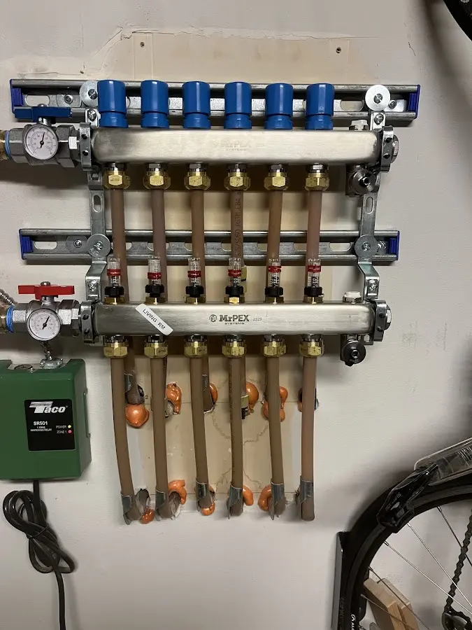 Plumber performing Water Heater Repair at a residential property in Fox Lake